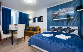 UnitApartments Rondo ONZ 3-pokojowe Apartamenty w Centrum Warszawy 1-8 osób Parking Metro WIFI Winda
